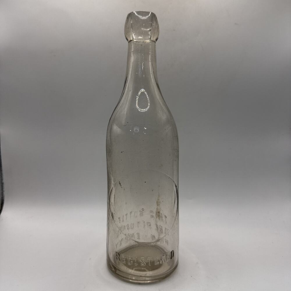 Antique Embossed Clear Glass Soda Bottle “Return When Empty” Registered Vintage